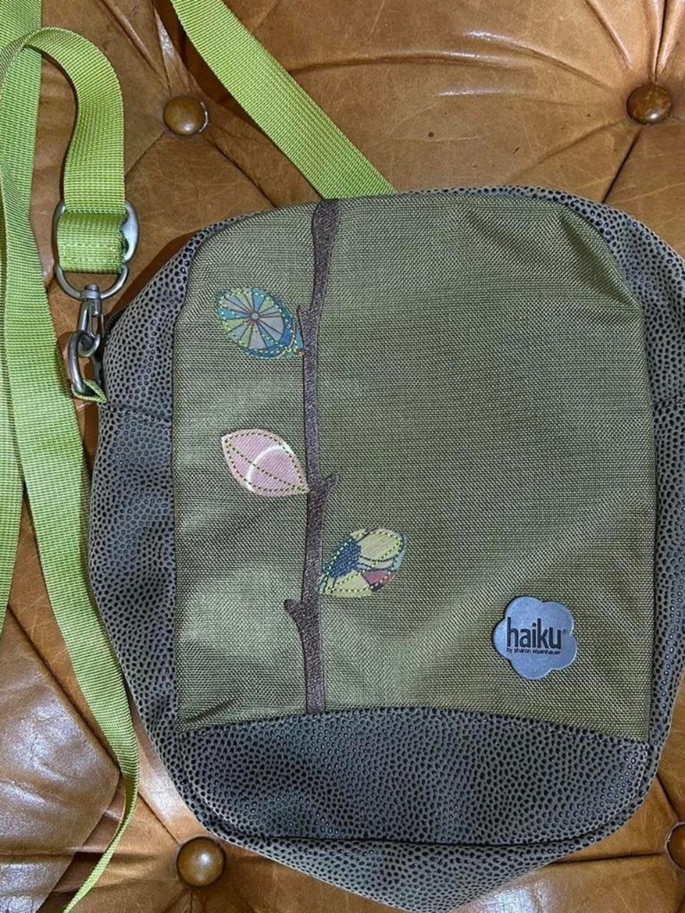 Haiku green crossbody bag with adjustable strap